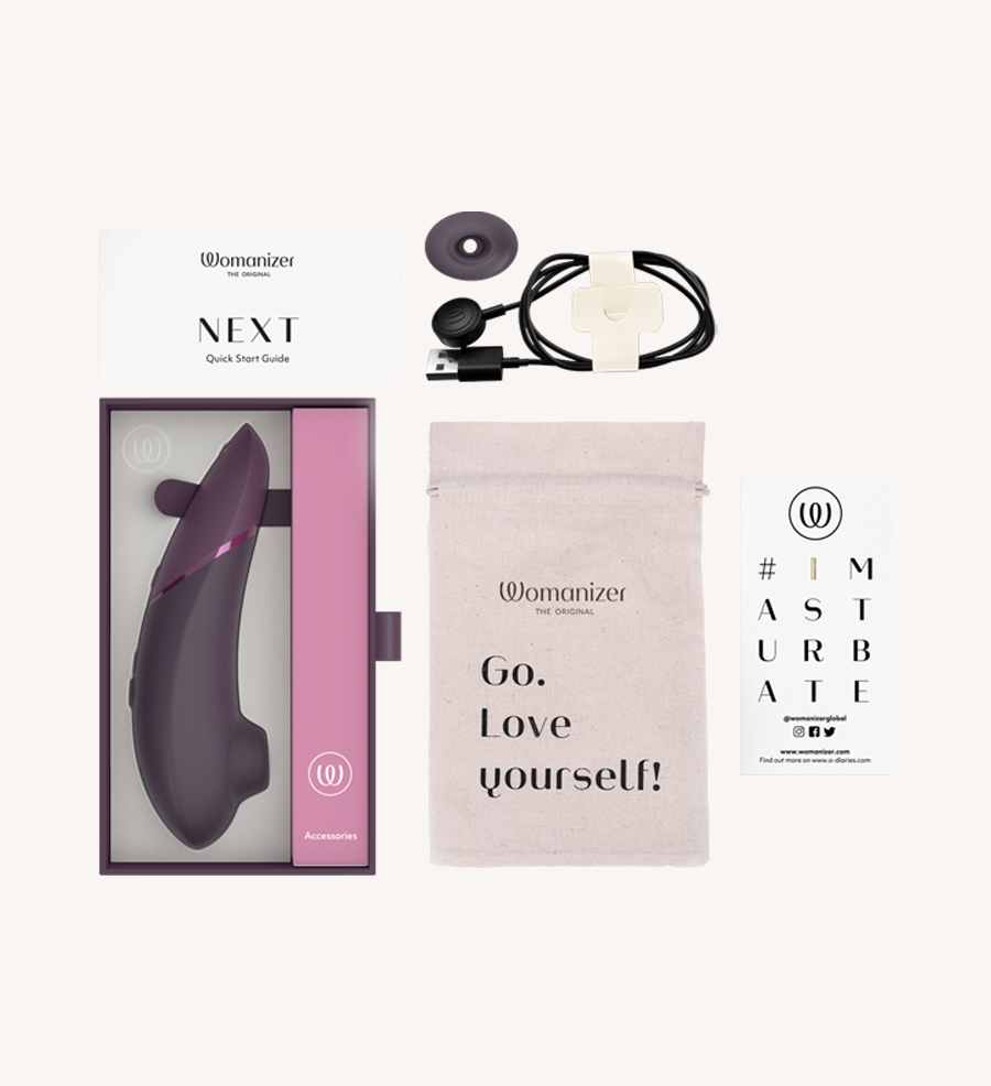 Kemasan WOMANIZER Next Dark Purple