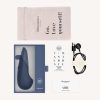 WOMANIZER Vibe Dark Blue Packaging